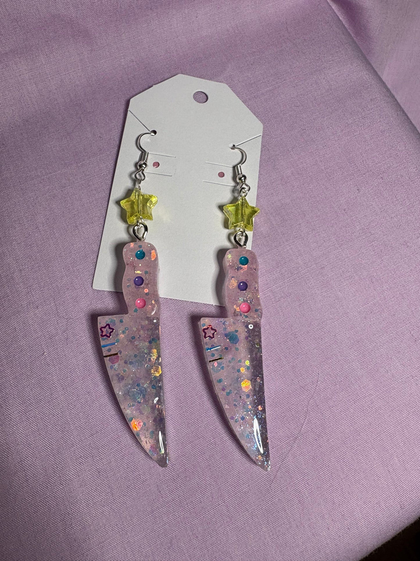 Needy girl knife earrings