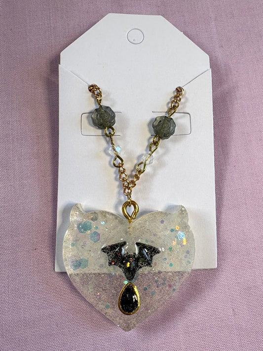Mischievous vamp heart necklace