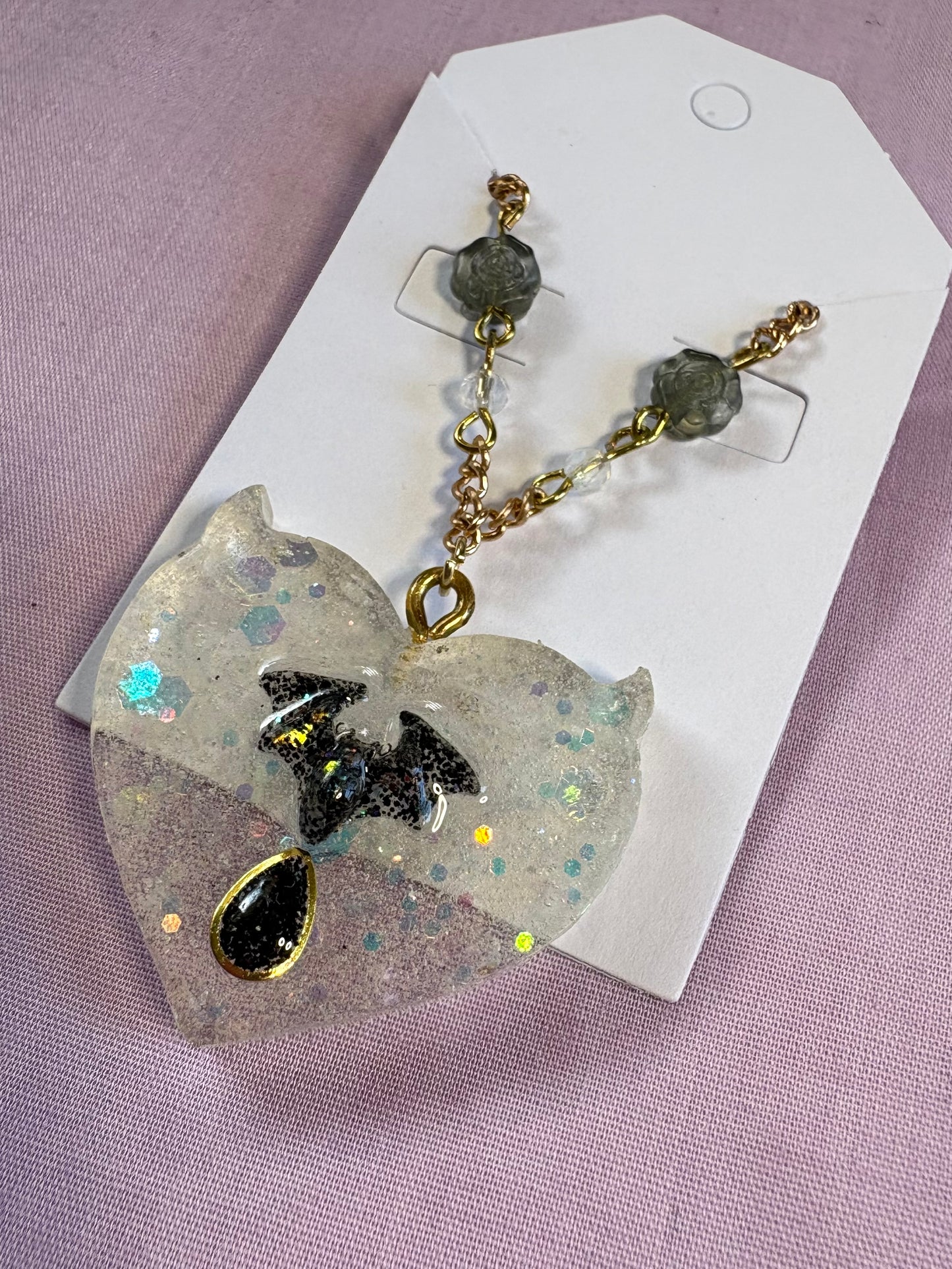 Mischievous vamp heart necklace