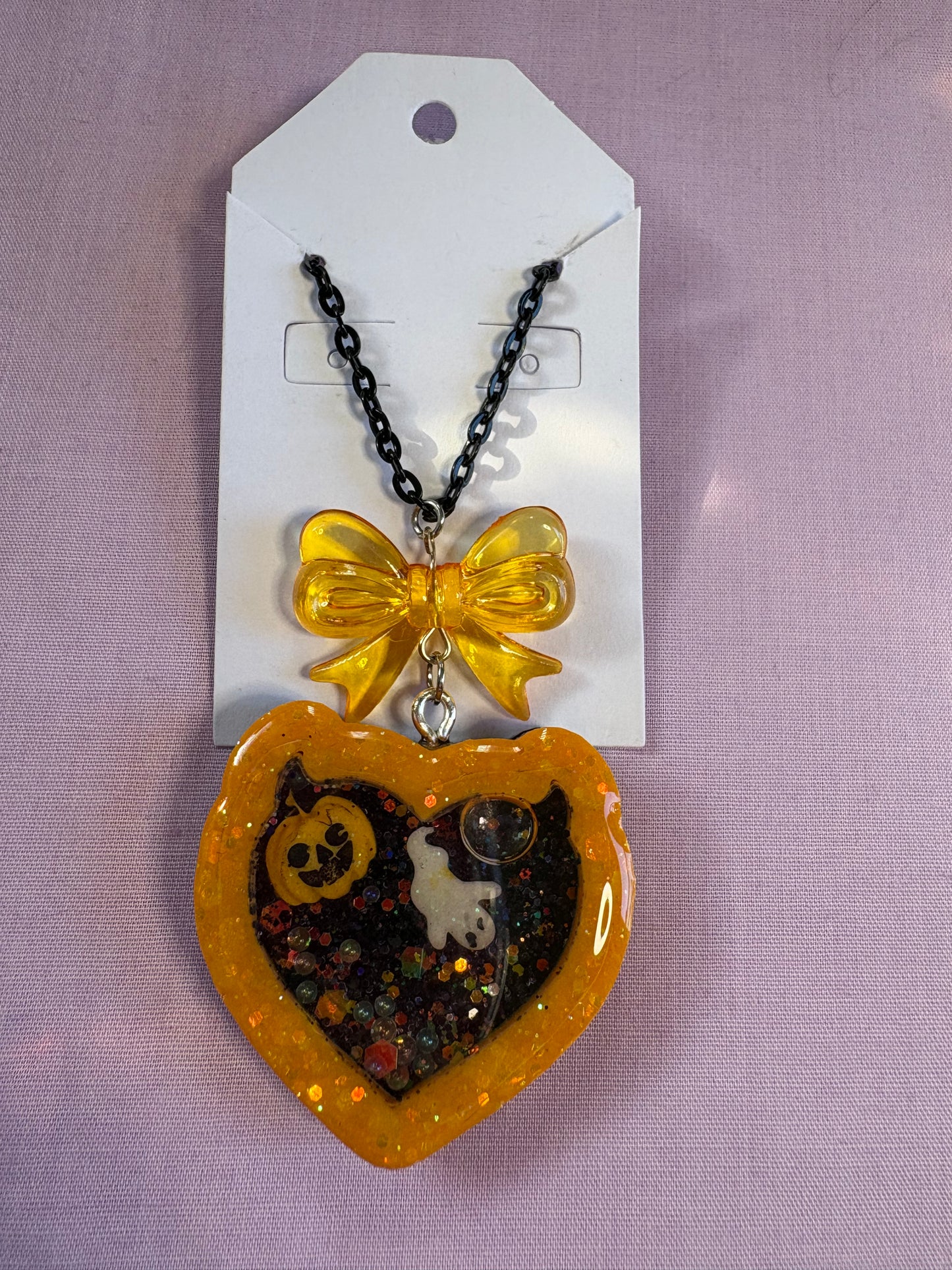 Spooky heart shaker necklace