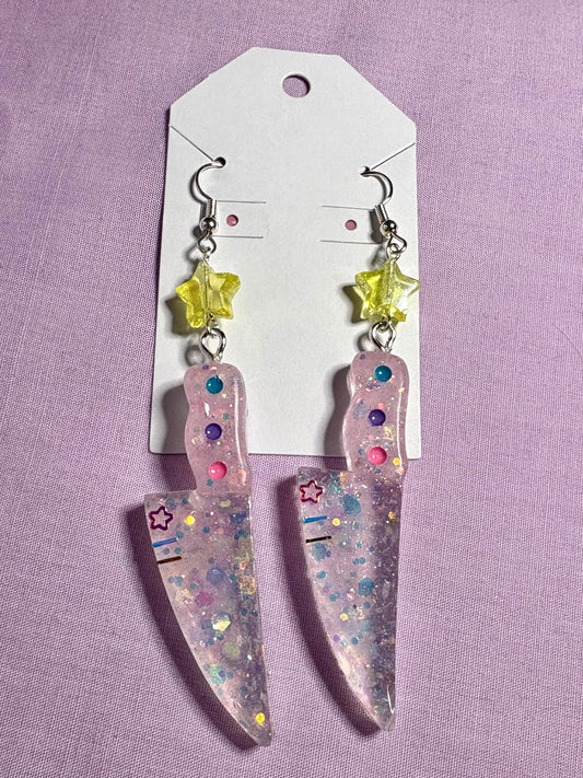 Needy girl knife earrings